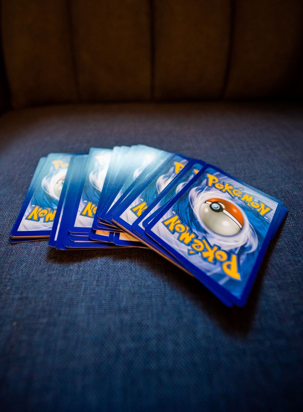 A fanned hand of Pokémon trading cards