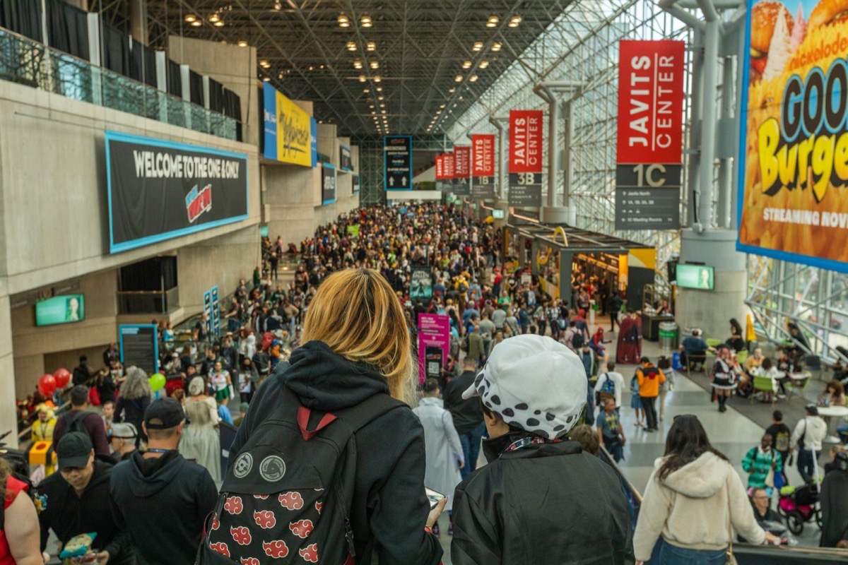 A crowded convention hall full of attendees